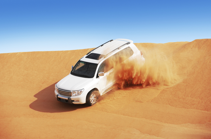 Dubai Super Saver: met een 4x4 naar een woestijnkamp en dinercruise in een dhow Dubai Super Saver: met een 4x4 naar een woestijnkamp en dinercruise in een dhow
